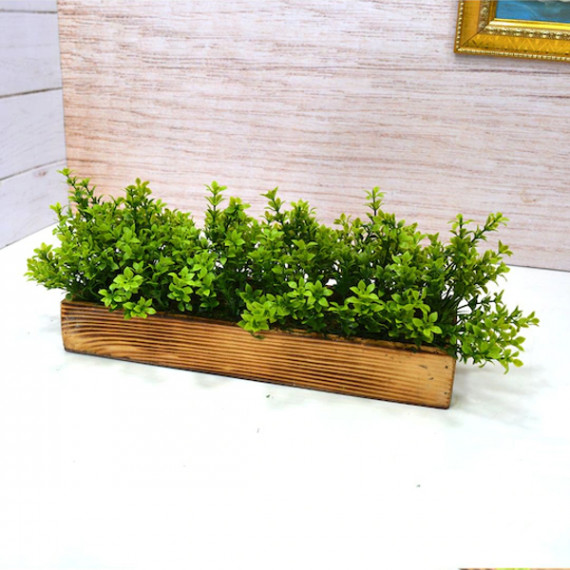 https://fineclothes.in/products/green-brown-artificial-gardenia-plant-bunch-in-wood-planter