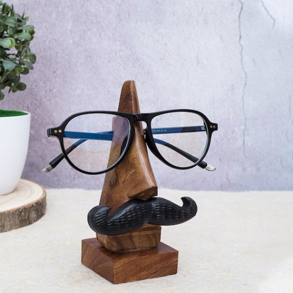 https://fineclothes.in/products/brown-handcrafted-eyeglass-holder-showpiece