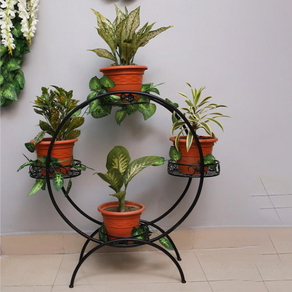 https://fineclothes.in/products/set-of-4-black-solid-metal-planters-with-round-shaped-stand