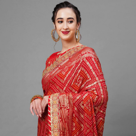 https://fineclothes.in/products/red-gold-toned-woven-design-bandhani-saree